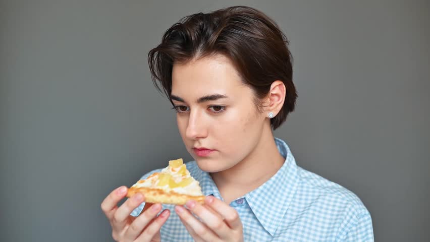 Spoiled junk food, woman eating pizza and suffering from gag reflex