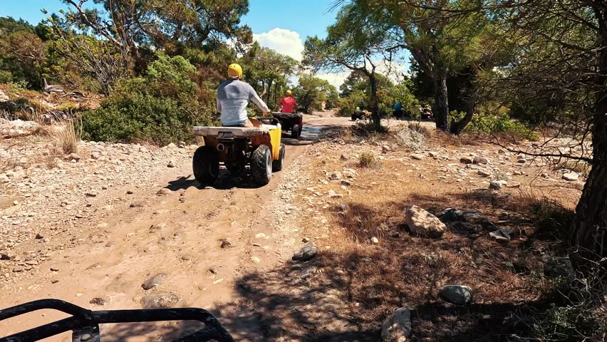 Safari Ride With ATV Quad Bikes Through the Kemer, Turkey. Adventures of Desert Off-road on ATV. Sand and Sand Borkhan. Mountains, Rocks and River Road Quad Cycle Travel. Excursion With People POV 4K