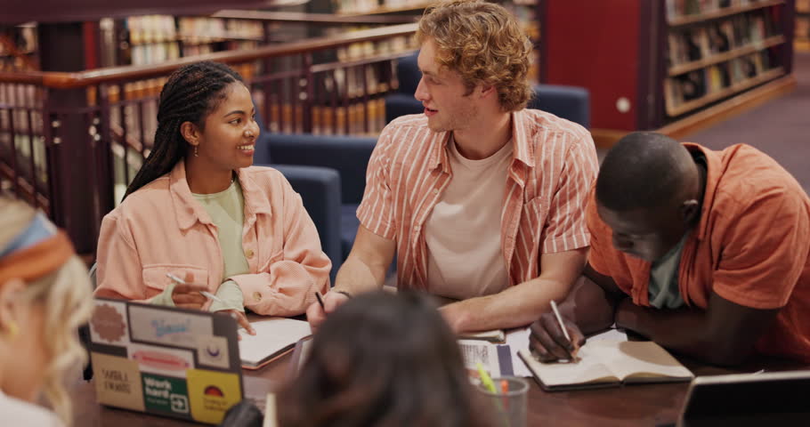 College library, students and discussion with books for communication, learning or knowledge. Education, diversity and friends with conversation for school project, study group or collaboration