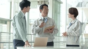 asian engineers in workwear meeting at the factory - Powered by Shutterstock - Get 15% off with code: PIKWIZARD15