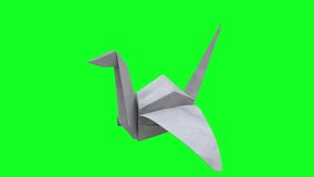 Paper crane flying on green screen - Powered by Shutterstock - Get 15% off with code: PIKWIZARD15