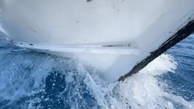 Boat prow and white foam water splashes. Close up view of front side. A sailing yacht bow cutting the ocean with water splashes. Concept of sea travel on a tour boat
 - Powered by Shutterstock - Get 15% off with code: PIKWIZARD15