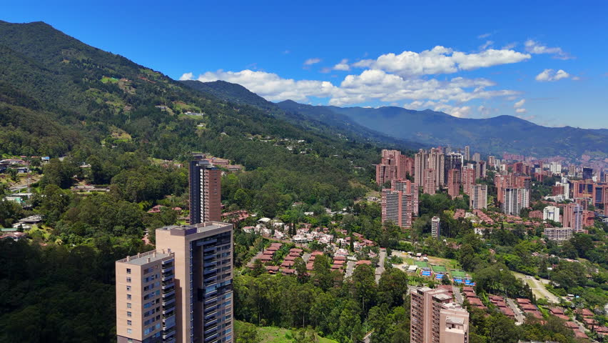 Aerial video made with a drone, in El Poblado, Medellín, Antioquia, Colombia; on a spectacular summer day.