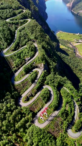 Drone top view Aerial view of the curved road to Lysebotn in Norway, Lysefjord on a beautiful summer day with a blue sky