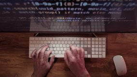 Hands of Professional Programmer is typing code. Top down shot - Powered by Shutterstock - Get 15% off with code: PIKWIZARD15