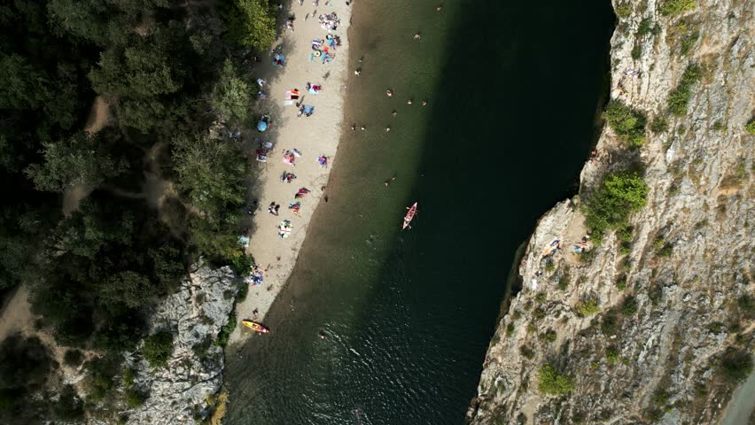Aerial view of the river beach close to Pont du Gard aqueduct bridge. Gardon River, France