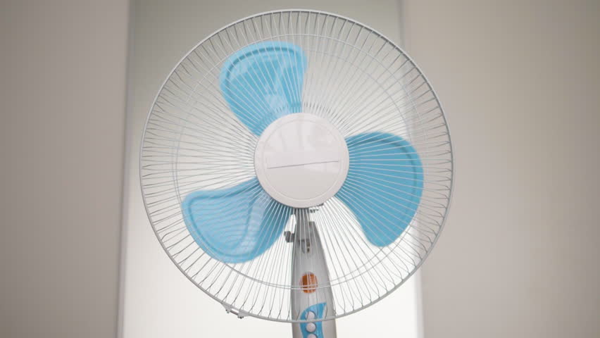 Cooling fan in summer close-up. Summer Propeller is spinning, hot summer concept.