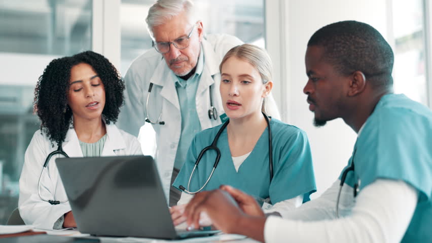 Laptop, medical and team in discussion in meeting for healthcare, brainstorming ideas and mentor training nurse intern. Group, doctors or people planning for conversation or collaboration in hospital - Powered by Shutterstock - Get 15% off with code: PIKWIZARD15