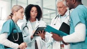 Tablet, doctors and team planning for brainstorming ideas, meeting and training nurses in hospital. Group, medical and people in discussion on tech for healthcare project, research and collaboration - Powered by Shutterstock - Get 15% off with code: PIKWIZARD15
