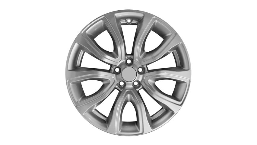 Car alloy wheel isolated on white background spins clockwise. New alloy wheel for a car in motion. Alloy rim isolated. Car wheel disc.