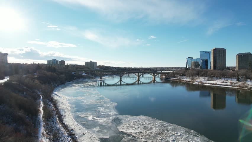 Aerial Drone Video of Downtown Saskatoon in Winter - Snow-Covered Urban Landscape, City Skyline, and Winter Wonderland