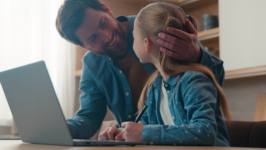 Family at home kitchen little daughter kid child girl schoolgirl confused with study need help learning e-learning laptop distant computer education writing homework difficult ask father for helping