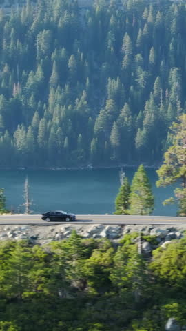 Vertical Screen: Experience the aweinspiring beauty of Tahoe Lake, California on vertical screen, offering breathtaking views of forests and mountains. Ideal for nature lovers and outdoor enthusiasts