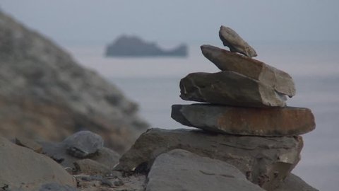 Stone figures on coast