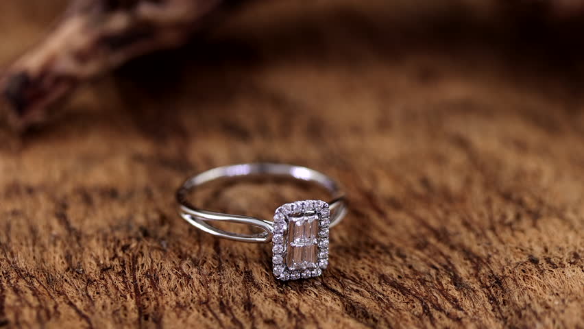 beautful shine diamond ring on wood background 