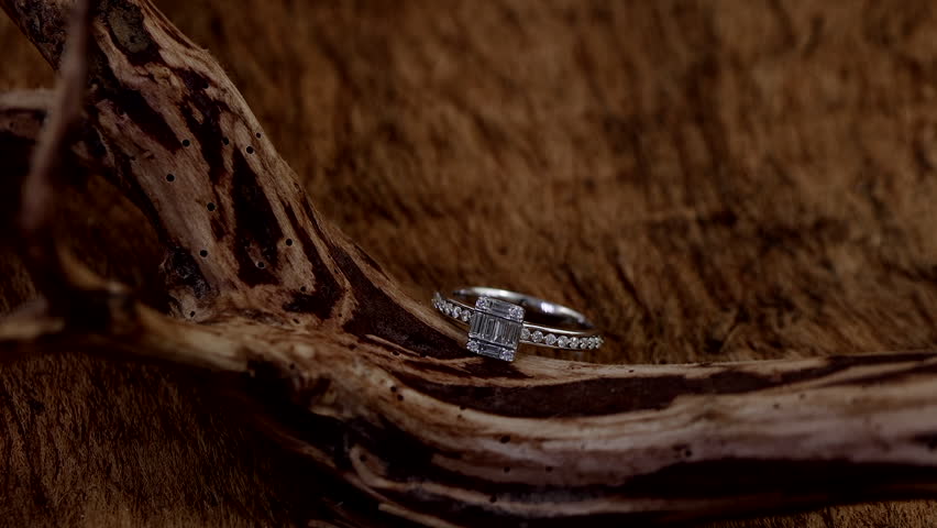 beautful shine diamond ring on wood background 