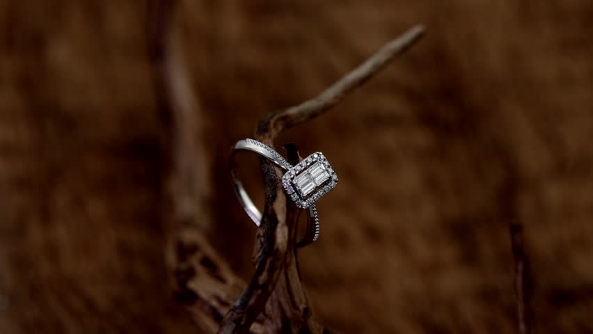 beautful shine diamond ring on wood background 