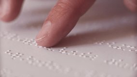 Blind person reading a book - Powered by Shutterstock - Get 15% off with code: PIKWIZARD15