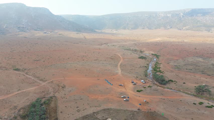 People Camping In Desert At Socotra, Yemen. Aerial Tracking Shot