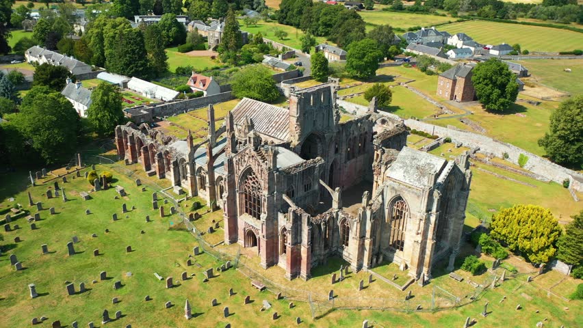 Melrose Abbey in the Scottish Borders, Scotland. Historic Landmark - Aerial Video