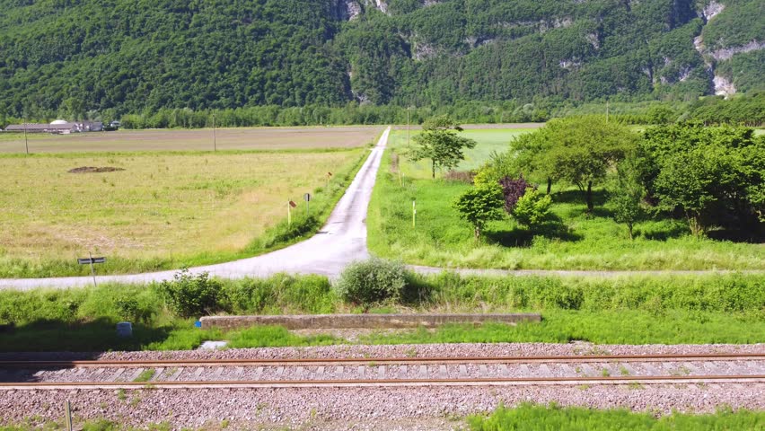 Spectacular steam train filmed in motion by a drone. Ancient locomotive that pulls carriages. train that runs on coal, snorts and makes a lot of smoke. Event where a historic means of transport passes