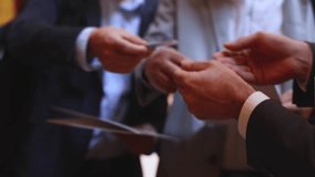 Process of checking in on a conference congress forum event, registration desk table, visitors and attendees receiving a name badge and entrance wristband bracelet and register electronic ticket - Powered by Shutterstock - Get 15% off with code: PIKWIZARD15