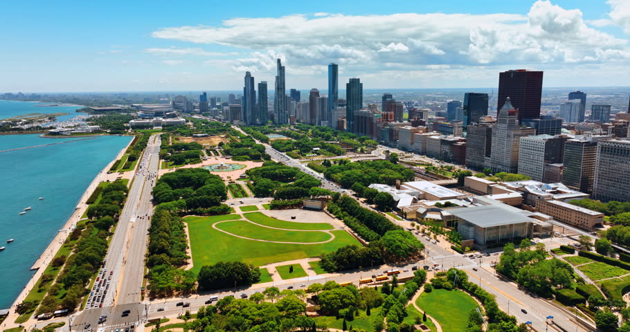 Picturesque scenery of Grant Park at the waterfront of a lake. Splendid view on panorama of Chicago, Illinois, the USA on sunny day.