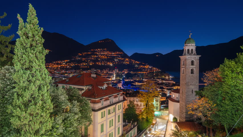 Lugano, Switzerland at dawn in autumn on Lake Lugano.