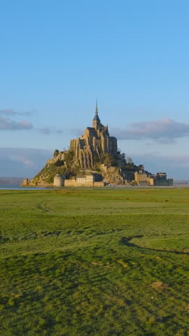 Aerial view of the world famous mont saint michel cathedral in normandy, one of france's most visited tourist attractions