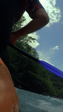 Whitewater Rafting - First Person Point of View. Paddling in River Rapids. Whitewater Rafting Team Descending Raging Rapids. Underwater Camera Shots. Active Outdoors Pursuit.