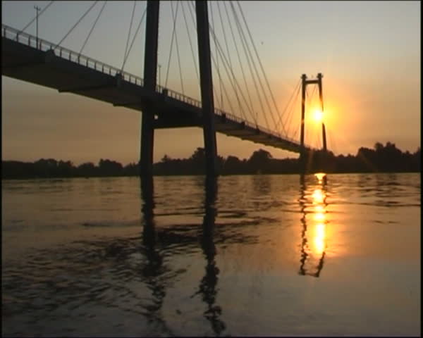  Sunrise. Solar patches of light on water.
