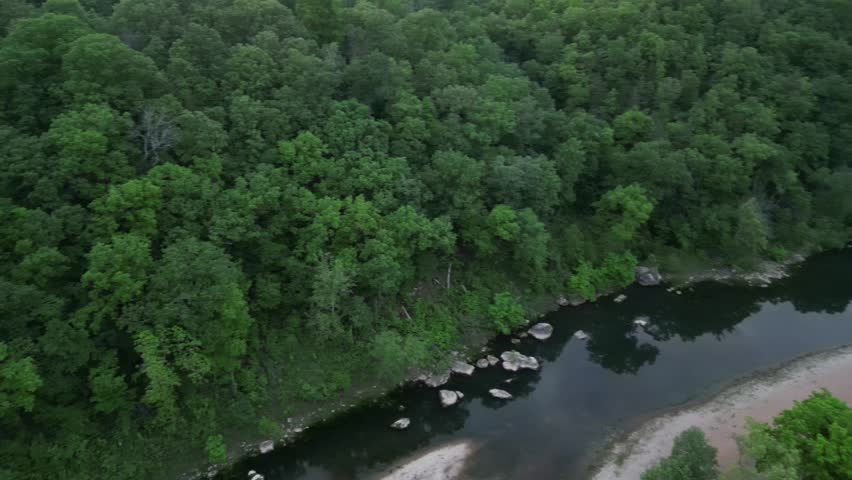 Ozark mountain creek river stream front log cabin in the woods 