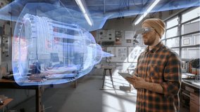 Engineer Using Augmented Reality in Industrial Workspace Holographic Jet Engine Design Daytime - Powered by Shutterstock - Get 15% off with code: PIKWIZARD15