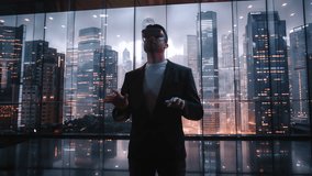 Businessman in Suit Using AR Headset for Holographic Data Interaction in Futuristic Office Stock Market Investing Finance Tech Success - Powered by Shutterstock - Get 15% off with code: PIKWIZARD15