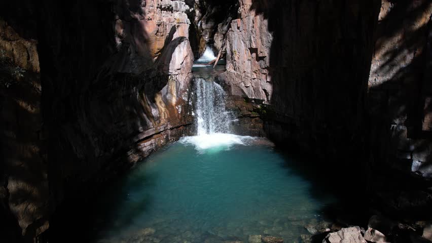Aerial View of Amazing Hidden Waterfalls and Natural Pools in Narrow Canyon. Cascade Creek Falls, Colorado USA