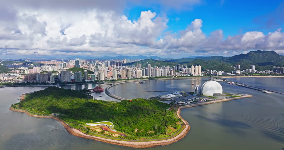 Aerial view of beautiful coastline and city skyline with modern buildings scenery in Zhuhai, Guangdong Province, China. Famous travel destination.