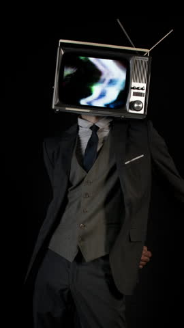 Tv head dancer in a smart suit dancing in a contemporary style in vertical