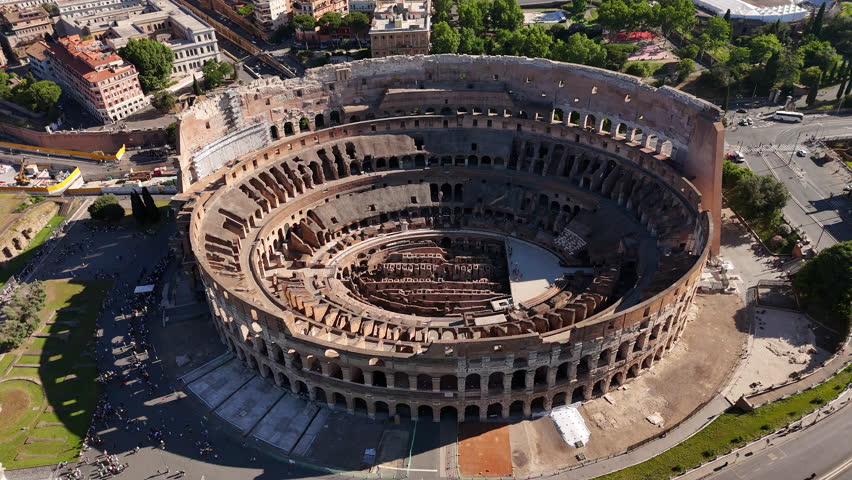 Drone view of the Colosseum in Rome, Italy. Flavius Amphitheater is an architectural monument of Ancient Rome, an aerial view. Rome, Italy