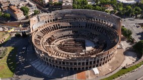 Drone view of the Colosseum in Rome, Italy. Flavius Amphitheater is an architectural monument of Ancient Rome, an aerial view. Rome, Italy - Powered by Shutterstock - Get 15% off with code: PIKWIZARD15