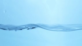 Fluid Dynamics Macro View of Fresh Water Droplets in Motion Nature's Symphony Slow-Motion Water Ripple Effect in Blue Hue. - Powered by Shutterstock - Get 15% off with code: PIKWIZARD15
