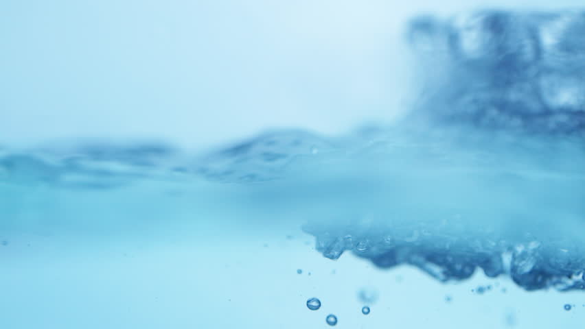 Liquid Tranquility Smooth Flowing Water Surface in Slow Motion.