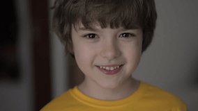 Portrait Little Boy Looking at Camera. Face Funny Contemplative Child. Close-up Portrait of Confident Inquisitive Laughs Happy Caucasian Teenage Boy. Eyes of Smiling Schoolboy. Positive Health Life.	 - Powered by Shutterstock - Get 15% off with code: PIKWIZARD15