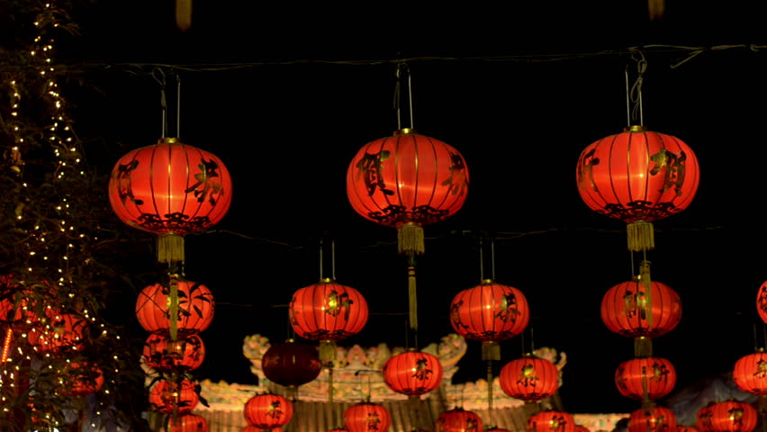BANGKOK, THAILAND  - FEBRUARY 9, 2013: Chinese lanterns shining at night at Wat