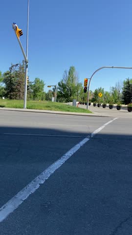 The city skyline of Downtown Calgary in Alberta, Canada is beautiful with modern tall buildings representing the financial and government district, clean lamdscape with green grass and Treeline 
