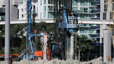 MIAMI - MARCH 06: Excavators hard at work as brickell Miami undergoes a revitalization in the real estate market March 6th, 2013 in Miami, Florida.  