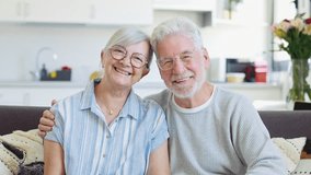 Happy mature husband and wife sit rest on couch at home hugging and cuddling, show care affection, smiling senior loving couple relax on sofa have fun, enjoy tender romantic family weekend together
 - Powered by Shutterstock - Get 15% off with code: PIKWIZARD15