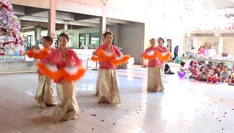 ANG THONG, THAILAND - CIRCA DECEMBER 2012: Thai traditional dancing by Orphans at Wat Tarn Jet Cho Temple.