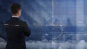 A man thought about the coordinate system and pie charts in the background to which light waves move and graphs grow. Scientific developments and technological research in the physics of processes. Cg - Powered by Shutterstock - Get 15% off with code: PIKWIZARD15