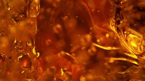 Super Slow Motion of Bubbling Golden Liquid in Detail. Extreme Macro Shot, Abstract Texture. Filmed on High Speed Cinema Camera, 1000 fps. - Powered by Shutterstock - Get 15% off with code: PIKWIZARD15