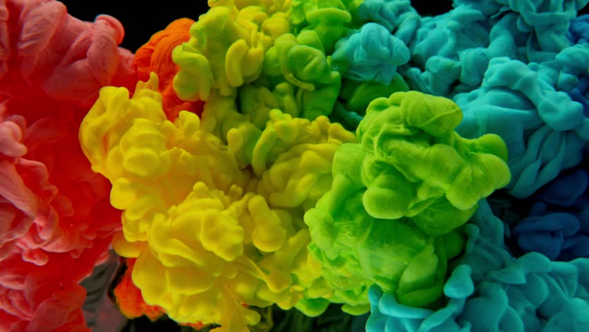 Super Slow Motion of Colored Paints Mixing in Water. Isolated on Black Background. Filmed on High Speed Cinema Camera, 1000fps.